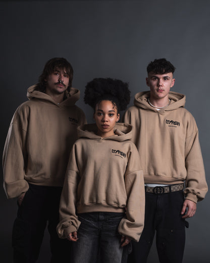 Group photo of three models in SYREN oversized hoodies – limited drop
